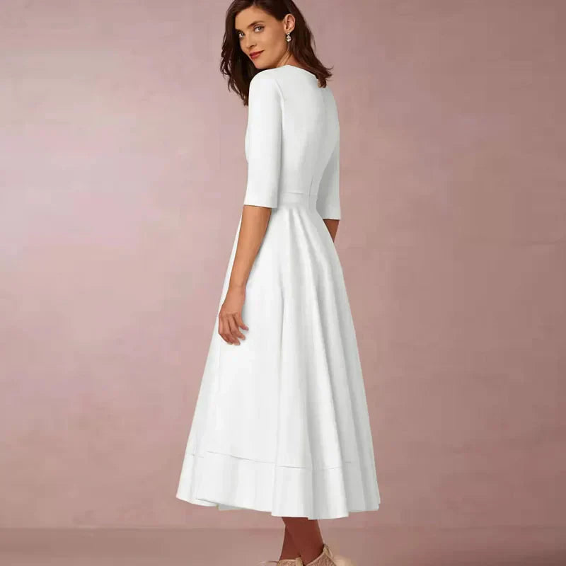 Azmira – Elegante abito midi dalla linea ad A